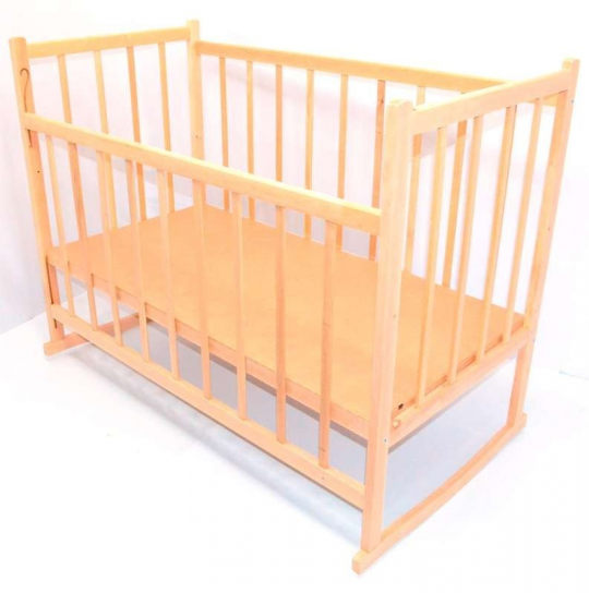 Кроватка детская деревянная с качалкой и опускающимся бортом Фото