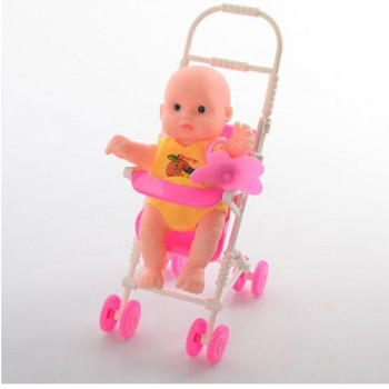 Кукла в пластиковой коляске
